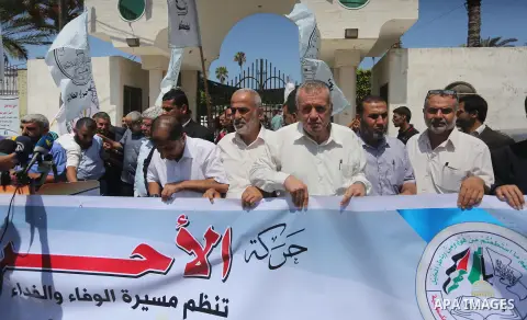 Palestinians take part during a protest to mark the 47th anniversary of the burning of Al-Aqsa Mosque, in Gaza city on Aug. 23, 2016. Photo by Mohammed Asad