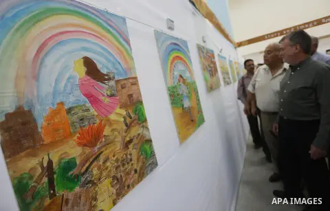 Director of UNRWA operations in Gaza Bo Shack attends the art exhibition "draw your dream for Gaza 2020", in Gaza city on Aug. 23, 2016. Photo by Mohammed Asad