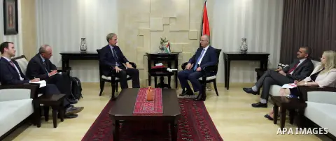 Palestinian Prime Minister Rami Hamdallah meets with the German Representative in Palestinian territories, Peter Beroyrt, in the West Bank city of Ramallah, Aug 24, 2016. Photo by Prime Minister Office