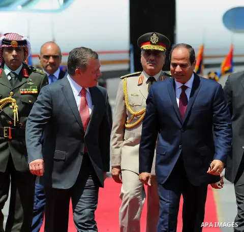 Egyptian President Abdel Fattah al-Sisi welcomes Jordan's King Abdullah II upon his arrival at Cairo's international airport on Aug. 24, 2016. Photo by Egyptian President Office
