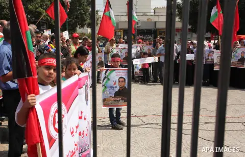 Supporters of the Popular Front for the Liberation of Palestine (PFLP) take part in a celebration of Bilal Kayed, in Gaza city on August 25, 2016. Palestinian prisoner Bilal Kayid has suspended his hunger strike after sp...