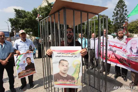Supporters of the Popular Front for the Liberation of Palestine (PFLP) take part in a celebration of Bilal Kayed, in Gaza city on August 25, 2016. Palestinian prisoner Bilal Kayid has suspended his hunger strike after sp...