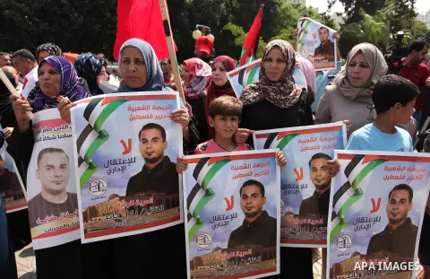 Supporters of the Popular Front for the Liberation of Palestine (PFLP) take part in a celebration of Bilal Kayed, in Gaza city on August 25, 2016. Palestinian prisoner Bilal Kayid has suspended his hunger strike after sp...
