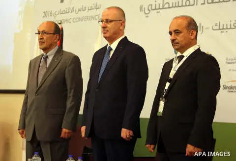 Palestinian Prime Minister, Rami Hamadallah, attends Economic MAS conference 2016, in the West Bank city of Ramallah, on Aug 31, 2016. Photo by Prime Minister Office