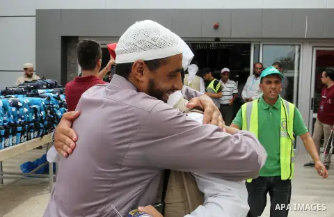 Palestinian Muslim pilgrims arrive at the Rafah border crossing between Egypt and the southern Gaza Strip, on August 31, 2016 ahead of their departure to the annual Hajj pilgrimage in Saudi Arabia's holy city of Mecca. P...