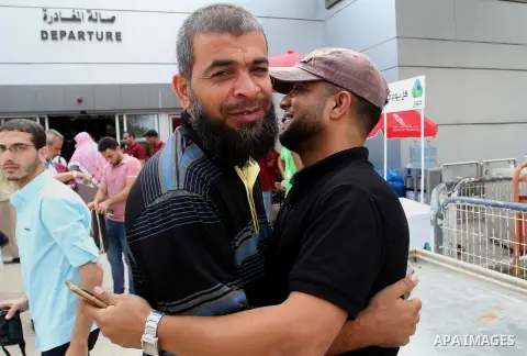 Palestinian Muslim pilgrims arrive at the Rafah border crossing between Egypt and the southern Gaza Strip, on August 31, 2016 ahead of their departure to the annual Hajj pilgrimage in Saudi Arabia's holy city of Mecca. P...