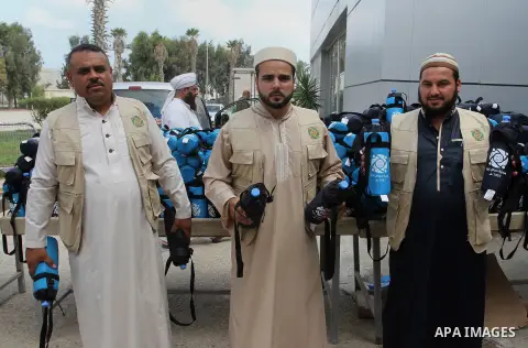 Palestinian Muslim pilgrims arrive at the Rafah border crossing between Egypt and the southern Gaza Strip, on August 31, 2016 ahead of their departure to the annual Hajj pilgrimage in Saudi Arabia's holy city of Mecca. P...