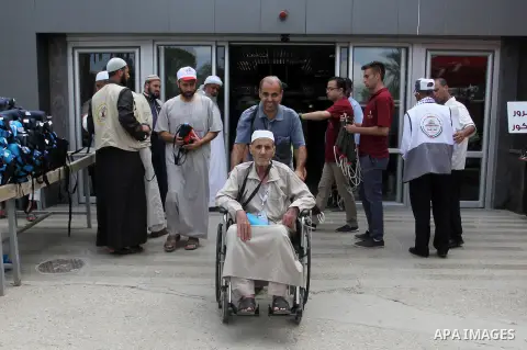 Palestinian Muslim pilgrims arrive at the Rafah border crossing between Egypt and the southern Gaza Strip, on August 31, 2016 ahead of their departure to the annual Hajj pilgrimage in Saudi Arabia's holy city of Mecca. P...