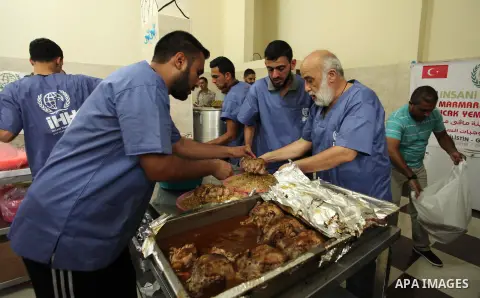 Chairman of Turkish humanitarian relief (IHH), Mohammed Kaya, attends the opening ceremony of a kitchen martyrs of the Freedom Flotilla (Mavi Marmara), which provides free meals for poor families, in Gaza city, on Sept....