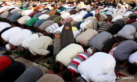 Palestinians attend the morning prayer of the Muslim holiday of the Eid al-Adha on September 12, 2016, in Khan Younis in the southern Gaza strip. Muslims across the world celebrate the annual festival of Eid al-Adha, or...