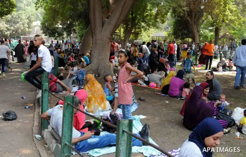 Egyptian enjoy the second day of Eid al-Adha or the feast of sacrifice, at a park in cairo, on Sep. 13, 2016. Muslims across the world are celebrating the annual festival of Eid al-Adha, or the Festival of Sacrifice, whi...