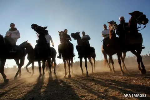 Palestinians ride horses during a Bedouin festival in Dair Al Balah in the central Gaza Strip September 16, 2016. Photo by Ashraf Amra