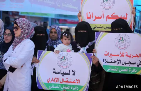Palestinians take part in a protest demanding release the Palestinian prisoners in Israeli jails, in front of Red cross office in Gaza city, on Sept. 19, 2016. Photo by Ashraf Amra