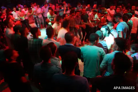 Palestinians celebrate during a traditional wedding party in Arabic "Henna's Night" in Rafah in the southern Gaza strip on Sep. 20, 2016. Palestinians perform the traditional dancing style derived from their folklore, th...