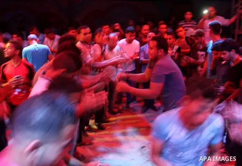 Palestinians celebrate during a traditional wedding party in Arabic "Henna's Night" in Rafah in the southern Gaza strip on Sep. 20, 2016. Palestinians perform the traditional dancing style derived from their folklore, th...
