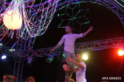 Palestinians celebrate during a traditional wedding party in Arabic "Henna's Night" in Rafah in the southern Gaza strip on Sep. 20, 2016. Palestinians perform the traditional dancing style derived from their folklore, th...