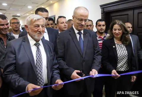 Palestinian Prime Minister, Rami Hamdallah, attends the launch of the national plan for sustainable production and consumption, in the West bank city of Ramallah, Oct. 05, 2016. Photo by Prime Minister Office
