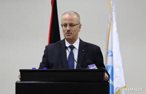 Palestinian Prime Minister, Rami Hamdallah, attends the launch of the national plan for sustainable production and consumption, in the West bank city of Ramallah, Oct. 05, 2016. Photo by Prime Minister Office