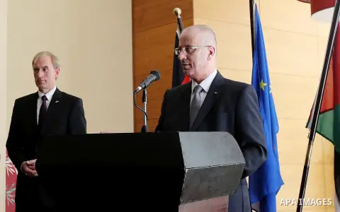 Palestinian Prime Minister Rami Hamdallah speaks during celebrations for German Unity Day, in the West Bank city of Ramallah, on October 06, 2016. Photo by Prime Minister Office