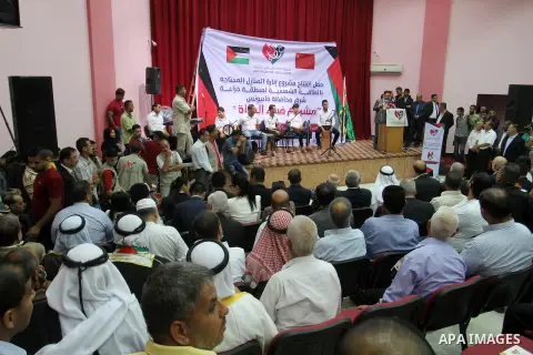 Chinese Ambassador to Palestine, Chen Zhong Xing and former Palestinian chief negotiator and member of the Central Committee of Fatah, Nabil Shaath attend the ceremony of opening the project of Lighting solar homes, in K...