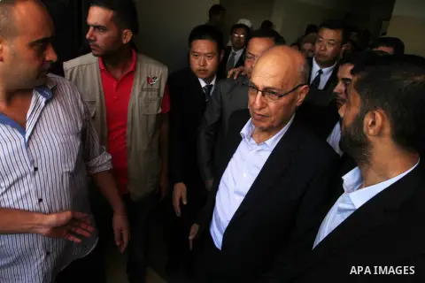 Chinese Ambassador to Palestine, Chen Zhong Xing and former Palestinian chief negotiator and member of the Central Committee of Fatah, Nabil Shaath open the project of Lighting solar homes, in Khan Younis in the southern...