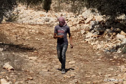 A Palestinian protester demonstrates against the expropriation of Palestinian land by Israel on October 6, 2016, in the village of Kfar Qaddum, near Nablus, in the occupied West Bank. Photo by Nedal Eshtayah