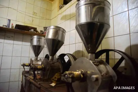 A coffee roastery are seen in a factory, in Cairo, Egypt on October 11, 2016. The shop of Abdul Salam Al-banan is one of the oldest shops of the coffee industry in Egypt. Photo by Amr Sayed