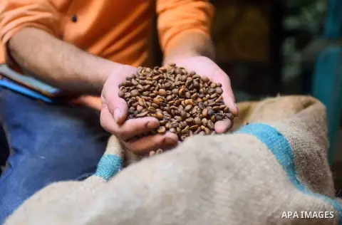 An Egyptian man makes a coffee at a factory, in Cairo, Egypt on October 11, 2016. The shop of Abdul Salam Al-banan is one of the oldest shops of the coffee industry in Egypt. Photo by Amr Sayed