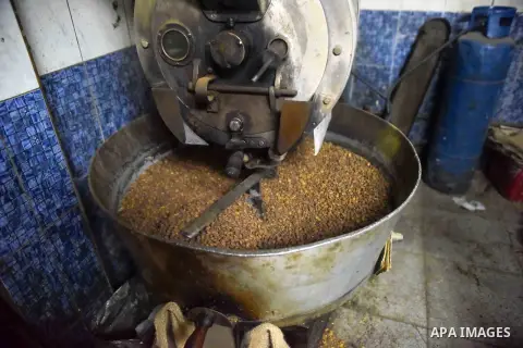 A coffee roastery are seen in a factory, in Cairo, Egypt on October 11, 2016. The shop of Abdul Salam Al-banan is one of the oldest shops of the coffee industry in Egypt. Photo by Amr Sayed