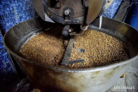 A coffee roastery are seen in a factory, in Cairo, Egypt on October 11, 2016. The shop of Abdul Salam Al-banan is one of the oldest shops of the coffee industry in Egypt. Photo by Amr Sayed