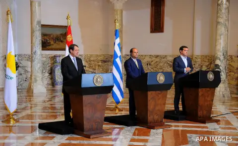 Egypt's President Abdel Fattah al-Sisi attends with Greek Prime Minister Alexis Tsipras and Cyprus' President Nicos Anastasiades a news conference and the summit about ways to combat illegal immigration to Europe at the...