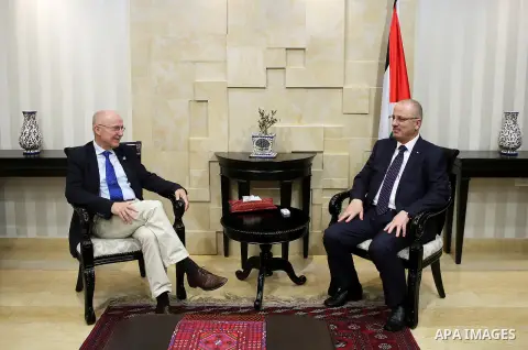 Palestinian Prime Minister Rami hamdallah meets with Secretary-General of the United Nations competent assistant sports affairs and development, Wilfried Lemke, in the West Bank city of Ramallah on October 12, 2016. Phot...