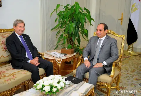 Egyptian President Abdel Fattah al-Sisi meets with European Union's Enlargement Commissioner Johannes Hahn, in Cairo, Egypt, on Oct. 12, 2016. Photo by Egyptian President Office
