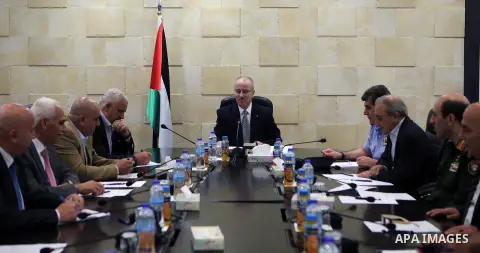 Palestinian Prime Minister, Rami hamdallah, chairs a meeting of the security establishment leaders, in the West Bank city of Ramallah, on October 13, 2016. Photo by Prime Minister Office