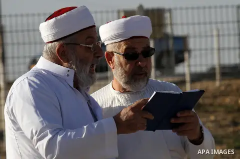 Samaritans pray on top of Mount Gerizim near the northern West Bank city of Nablus on October 17, 2016 during Sukkot (Tabernacles) celebrations. Sukkot marks the exodus of the ancient Hebrew people from Egypt. The Samari...