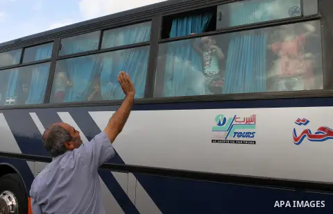 Palestinians wait for travel permits to cross into Egypt through the Rafah border crossing after it was opened by Egyptian authorities for humanitarian cases, in Rafah in the southern Gaza Strip October 19, 2016. Photo b...