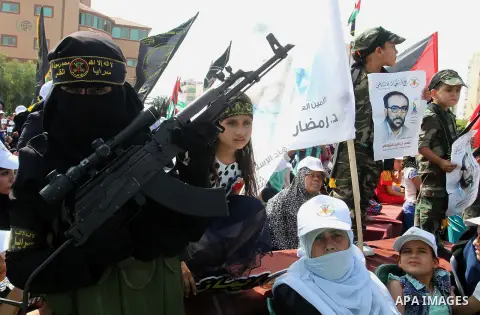 Palestinians attend a rally marking the 29th anniversary of the foundation of the Islamic Jihad movement in Gaza City October 21, 2016. Photo by Abed Rahim Khatib