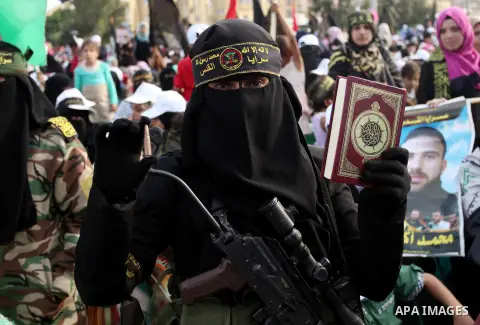 Palestinians attend a rally marking the 29th anniversary of the foundation of the Islamic Jihad movement in Gaza City October 21, 2016. Photo by Ashraf Amra