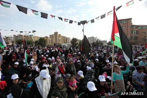 Palestinians attend a rally marking the 29th anniversary of the foundation of the Islamic Jihad movement in Gaza City October 21, 2016. Photo by Ashraf Amra