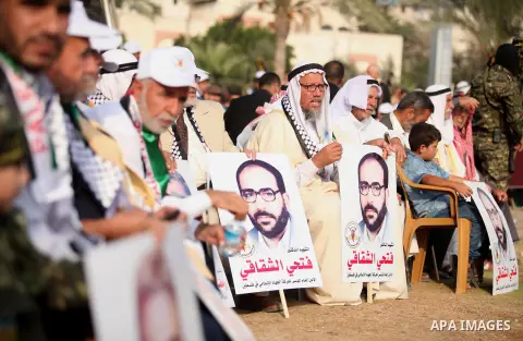 Palestinians attend a rally marking the 29th anniversary of the foundation of the Islamic Jihad movement in Gaza City October 21, 2016. Photo by Ashraf Amra