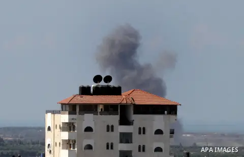 Smoke rises in Egypt's North Sinai as seen from the border of southern Gaza Strip with Egypt on Oct. 23, 2016. The Egyptian Air Force Sunday pounded jihadist groups in the Sinai Peninsula, reportedly killing 70 fighters...