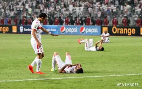 Zamalek's players react after losing the CAF Champions League football competition following the second round of the final match against South Africa's Mamelodi Sundowns on October 23, 2016 at the Borg el-Arab Stadium ne...