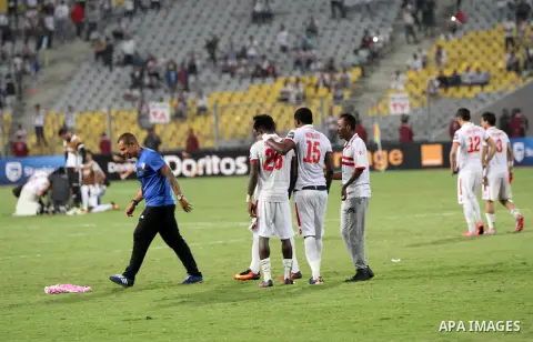 Zamalek's players react after losing the CAF Champions League football competition following the second round of the final match against South Africa's Mamelodi Sundowns on October 23, 2016 at the Borg el-Arab Stadium ne...