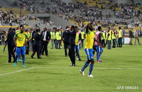 South Africa's Mamelodi Sundowns players celebrate after winning the CAF Champions League football competition following the final match against Egypt's Zamalek club on October 23, 2016 at the Borg el-Arab Stadium near A...