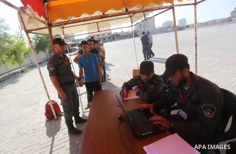 Palestinian applicants undergo a physical examination at a Hamas-run police recruitment centre in Gaza City October 24, 2016. Photo by Mohammed Asad