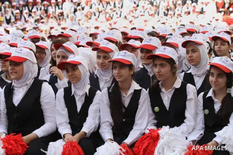 Palestinian students celebrate after winning the Best School Competition "challenge the Arab reading" of the more than 30 thousand schools in the Arab world, in the West Bank city of Nablus, on October 24, 2016. Photo by...