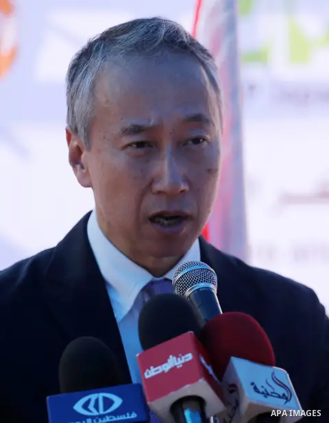 Japanese Ambassador to Palestine, Takeshi Okubo, Speaks during the unveiling of the foundation stone during a rally of the Breast Cancer Awareness campaign, in Gaza City on Oct. 26, 2016. Photo by Mohammed Asad