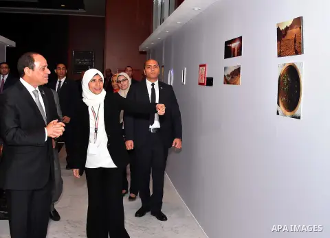 Egyptian President Abdel Fattah al-Sisi attends the exhibition during the the first national youth conference in the Red Sea resort of Sharm Al-Sheikh, in the South Sinai governorate, south of Cairo, Egypt, on Oct. 26, 2...