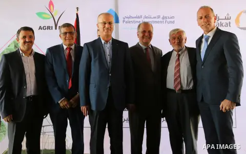 Palestinian Prime Minister, Rami Hamadallah, attends the Opening the Palestine Company for the production and marketing of fresh herbs,in Jeftlek village near Jordan Valley in the West Bank, on Oct 30, 2016. Photo by Pri...