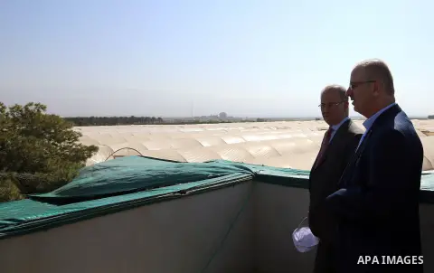 Palestinian Prime Minister, Rami Hamadallah, attends the Opening the Palestine Company for the production and marketing of fresh herbs,in Jeftlek village near Jordan Valley in the West Bank, on Oct 30, 2016. Photo by Pri...